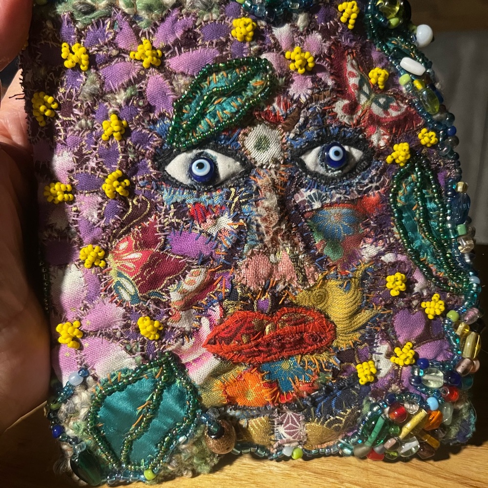 Hand made womans bead embroidered bag